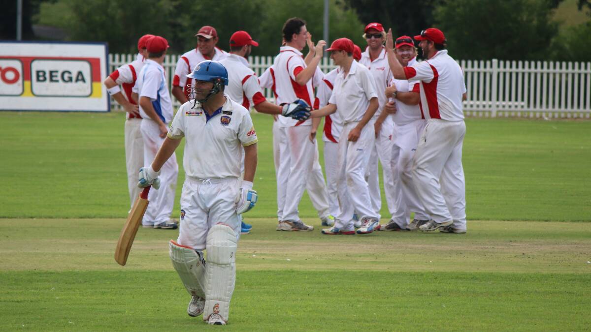 • The Eden A grade cricket side celebrates a wicket as Bega-Angledale’s Dave Allen returns to the sheds on Saturday. 
