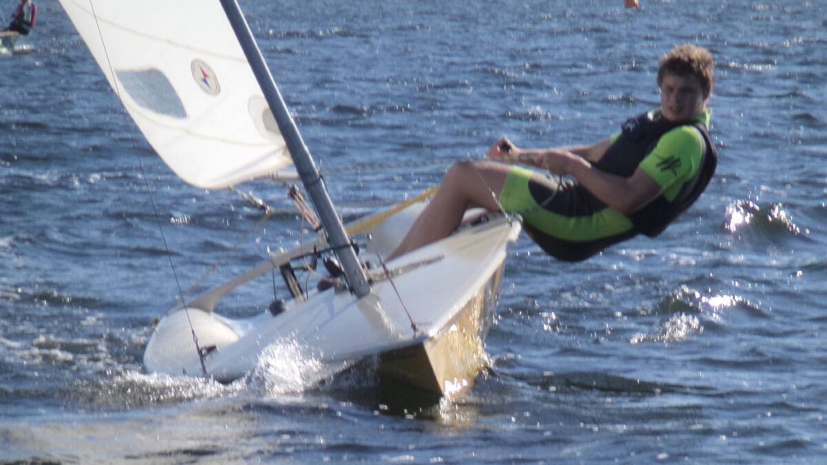 • Alister French is a rising star of the club as he loops around the course on club dinghy Leader. 