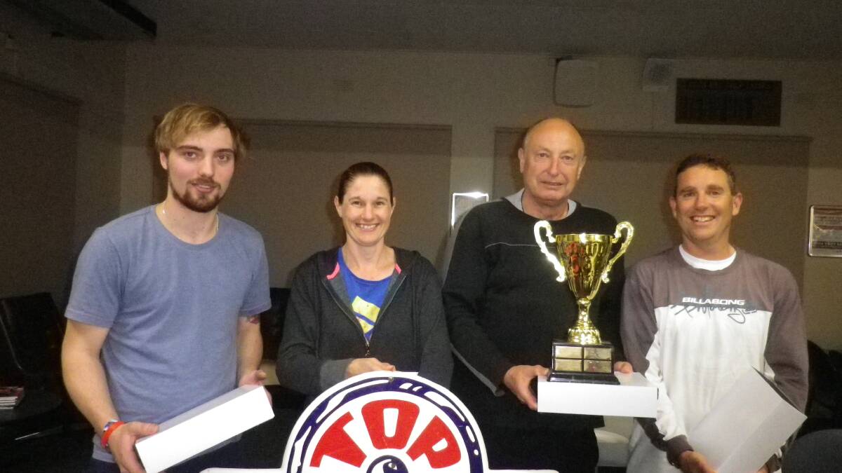 • Division one winners from team Helloworld are (from left) Jock Lee, Tammy Edmonds, John Watkins and Chris Thomas.