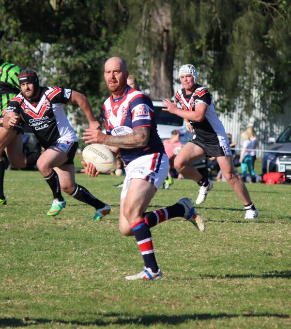 • Rooster Clay Child looks for support after finding a gap in the Cooma line in Bega last week. The Roosters will be at home to the Narooma Devils on Sunday. 