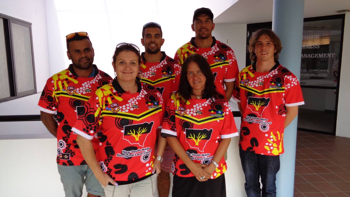 • Members of the Indigenous dream team and sponsors from Wandarma celebrating the arrival of special jerseys are (back, from left) Steven Luff, Dillon Aldirdge, Joe Alrdidge, Jake Frances (front) Wandarma program manager Rachel Wallace and administration officer Jo Norton-Baker. 