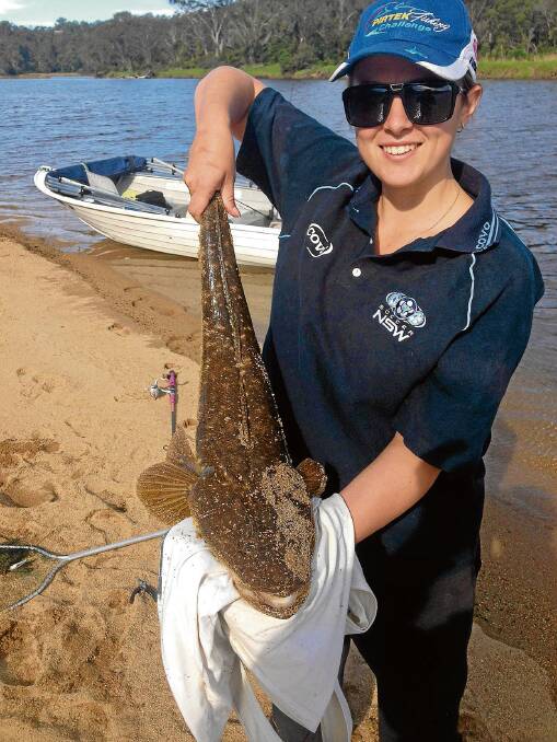 • Bega’s Kim Constable shows off her flathead she caught on Sunday before releasing it. 