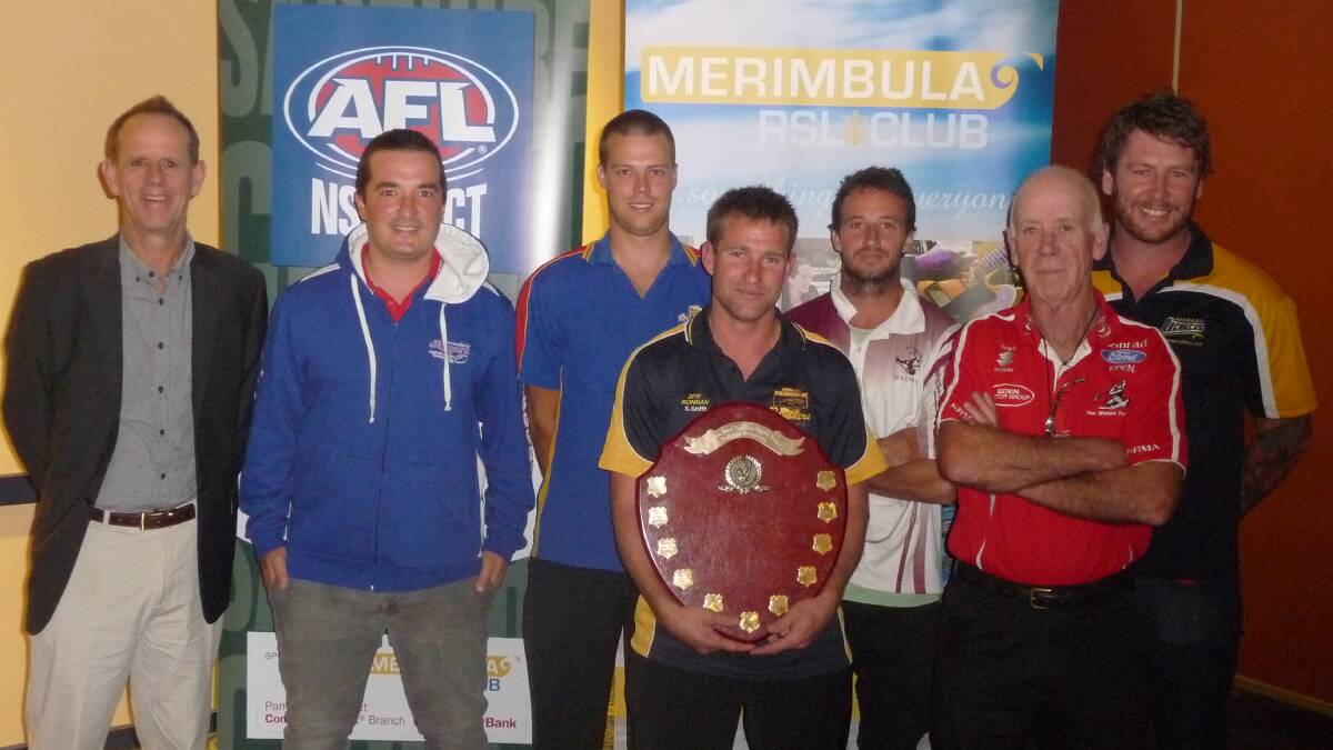 • Celebrating the launch of the Sapphire Coast AFL season with the presentation of last year’s premiership are (from left) Tim Shepherd, Nick Dillon, Rowan Hawkey, Sean Smith, Ryan O’Loghlin, Greg Hooper and Dale Cameron.