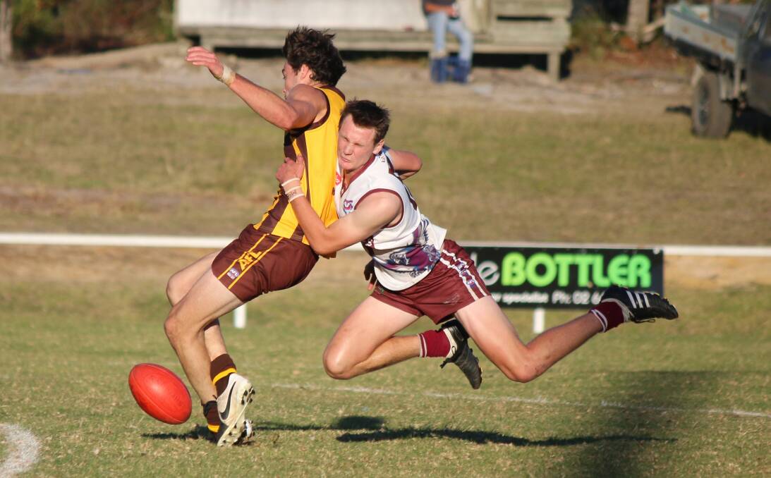 • Tathra Sea Eagle Bayden Pilbeam gets airborne in a tackle on his Pambula opponent on Saturday. The Panthers ran away with the match.
