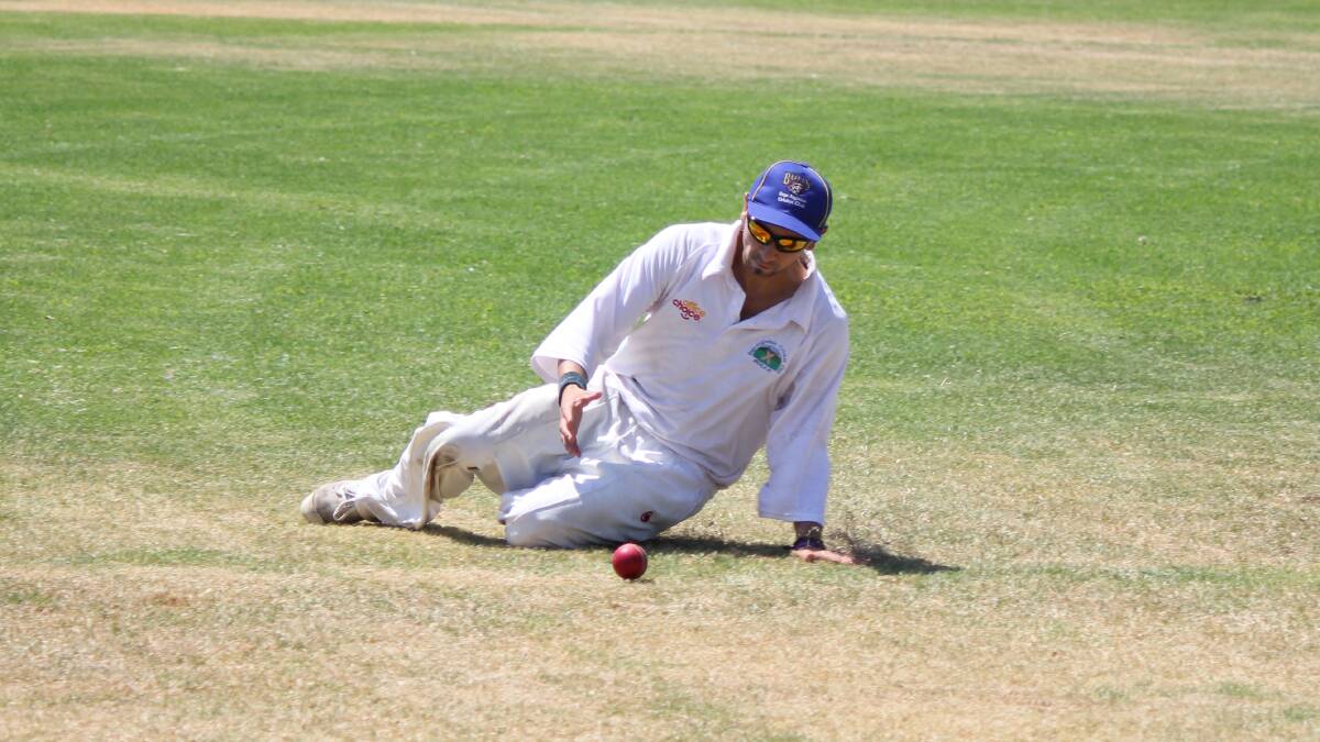 • Bega-Angledale’s Brad Moon slides for the ball to stem the flow of runs. The Bulls will be in the hunt for redemption when they take on Pambula tomorrow. 