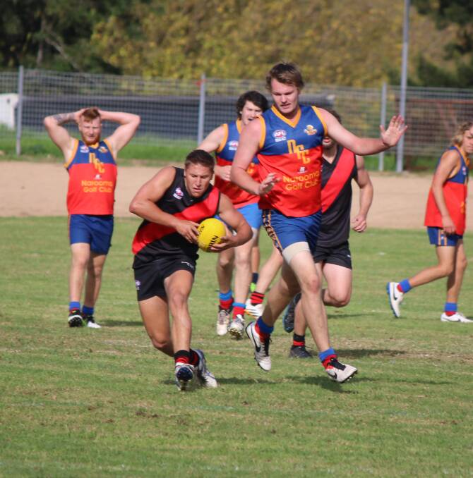 • Shannon Shepherdson takes a mark against the Narooma Lions when the two clubs met recently. 