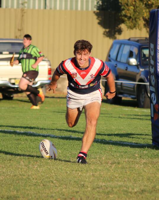 • Robbie Ringland is ecstatic as he runs in his third try against the Candelo-Bemboka Panthers on Saturday. 