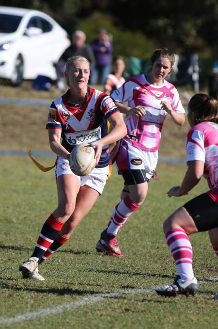 • Bega Chick Joccoaa Rogers dummies and steps as she reaches the Pink Panthers’ line on Sunday morning. Rogers led the point scoring for the Bega team with three tries and 17 conversions. 