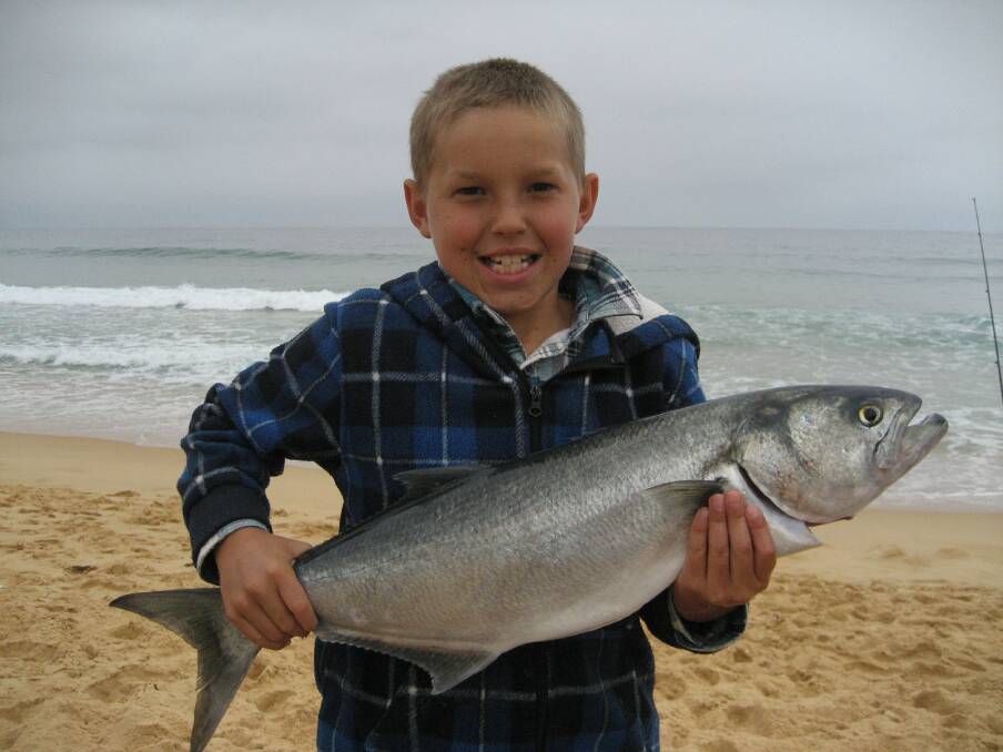 • Lachlan Bassett with his 5.4kg salmon he caught off Tura Beach recently. 