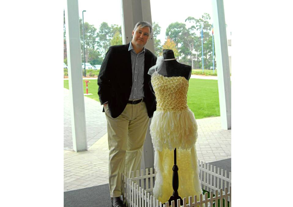 NOT A FAN: Cr Andrew Guile with Connie the condom dress in 2013.