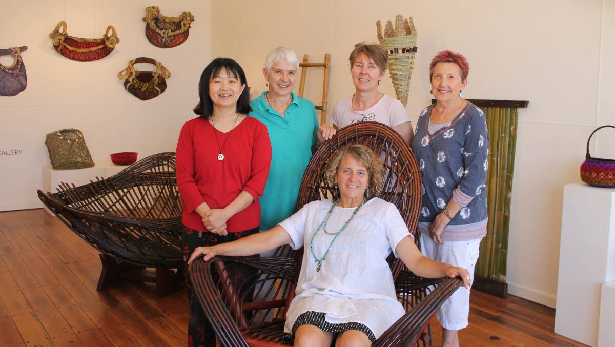 Some of the artists involved in the Interwoven exhibition include (from left) Reiko Healy, Robyn Leavey, Mary Peach, Cathy Jarratt and (seated) Gabrielle Powell.