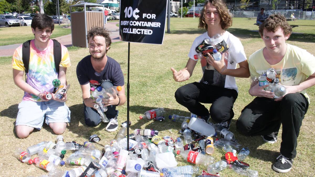 Attracted by the idea of Cash for Containers are (from left) Daniel Stoddard, Tom Weatherall, Lachlan Rubly and Dennis Peart who gathered in Littleton Gardens. 