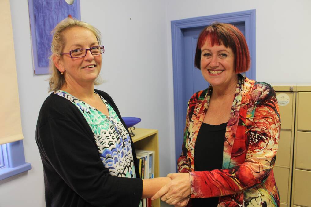 Quaama Public School’s new principal Kathryn Davis (right) is welcomed to the office by the school admin manager Penny Crowley.