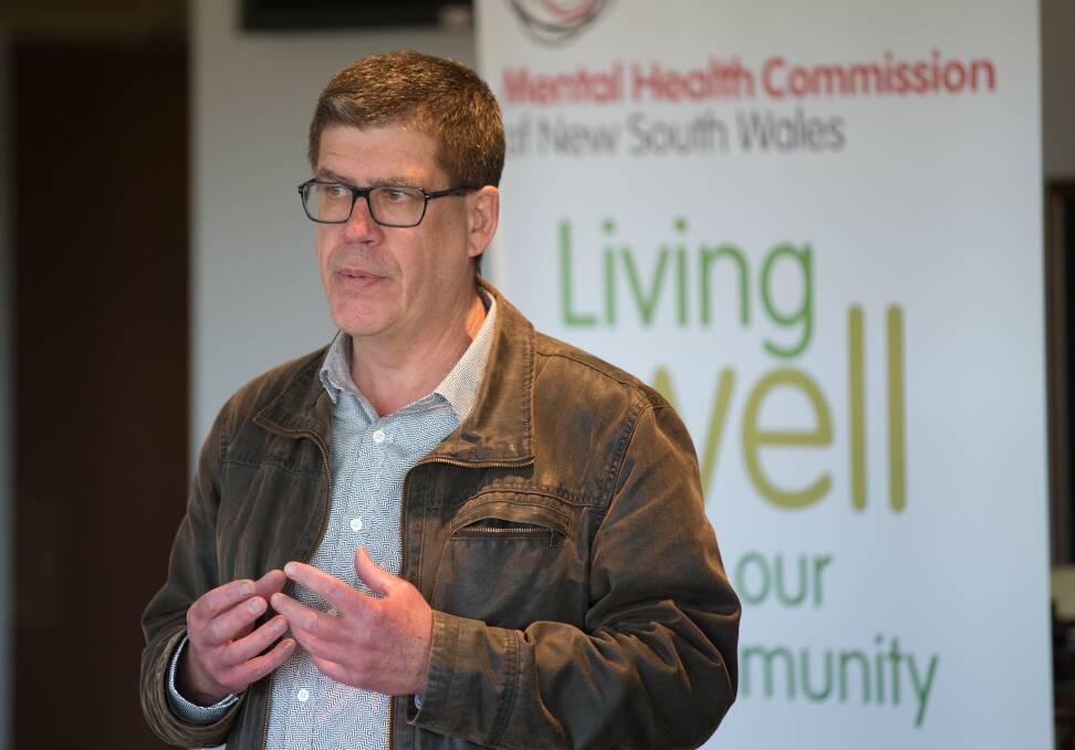 Peer support worker Tim Heffernan speaks to attendees at the Sapphire Coast Turf Club. Photo: NSW Mental Health Commission. 