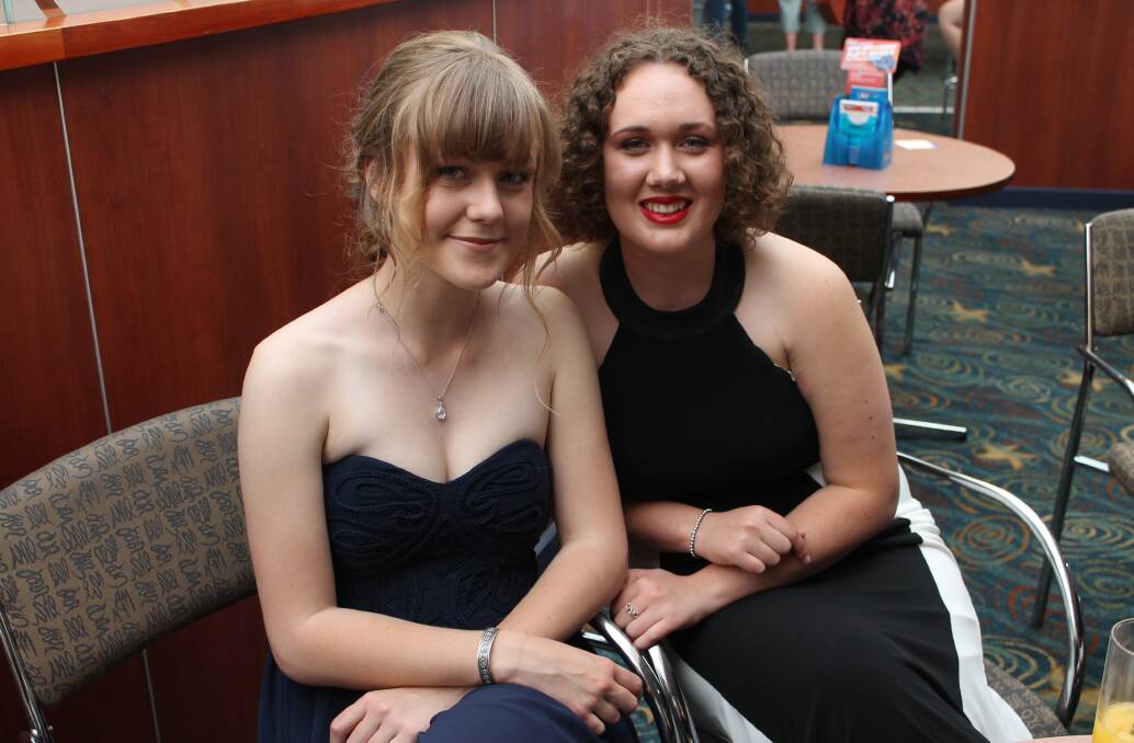 Bega High School student Angela Stoddard (left), who was named on the HSC All-Rounders list, at her Year 12 formal with her friend Lisa Toolin.