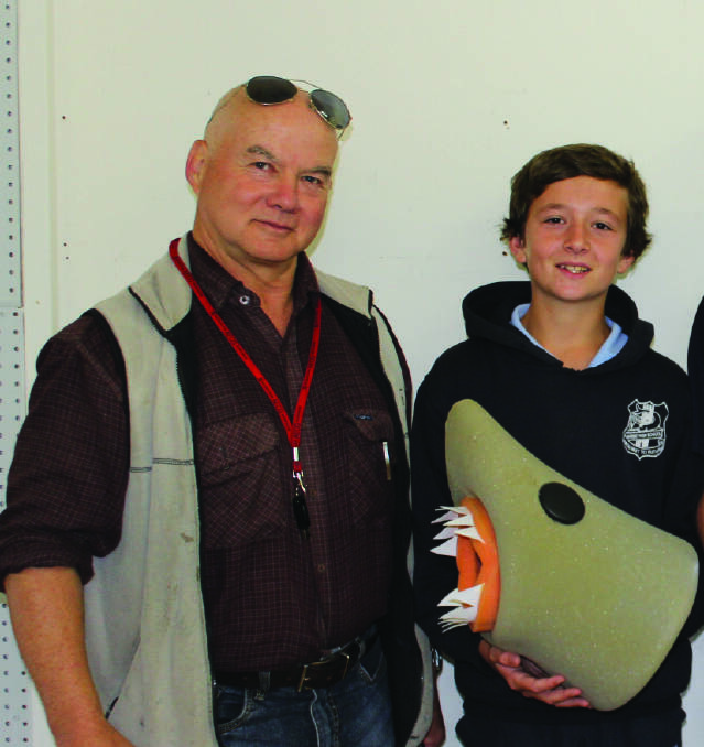 Eden Marine High School art teacher Stephen Faggotter with Year 8 student Jarod Devon and his winning Shark last year.