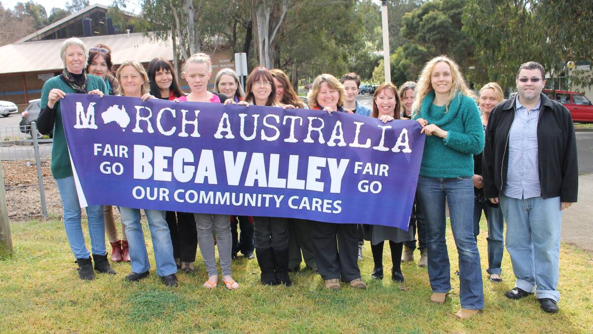 March Bega Valley organiser Anna Reilly (third right) rallies the Illawarra Bega TAFE Campus community services certificate IV and diploma students (from left) Tanya Anderson, Jayne Davies, Tracey Escreet, Lies Paijmans, Bianca Wilson, Alexandra Storm, Laura Wilcox, Glenys Cody, Nina Levido, Faye Harrison, Letitia Carroll, Julie Sanders and Andrew Lund. 
