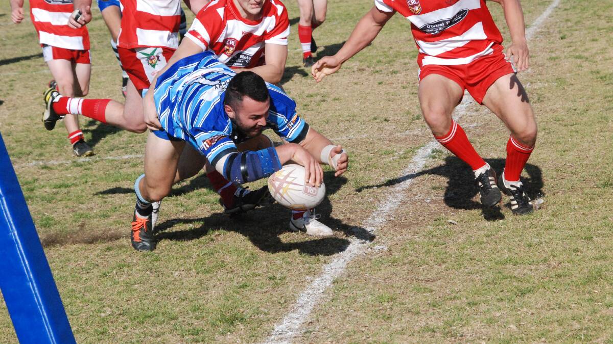 TRY TIME: Moruya Sharks’ Dillon Johnson scores in the corner at Ack Weyman Oval.