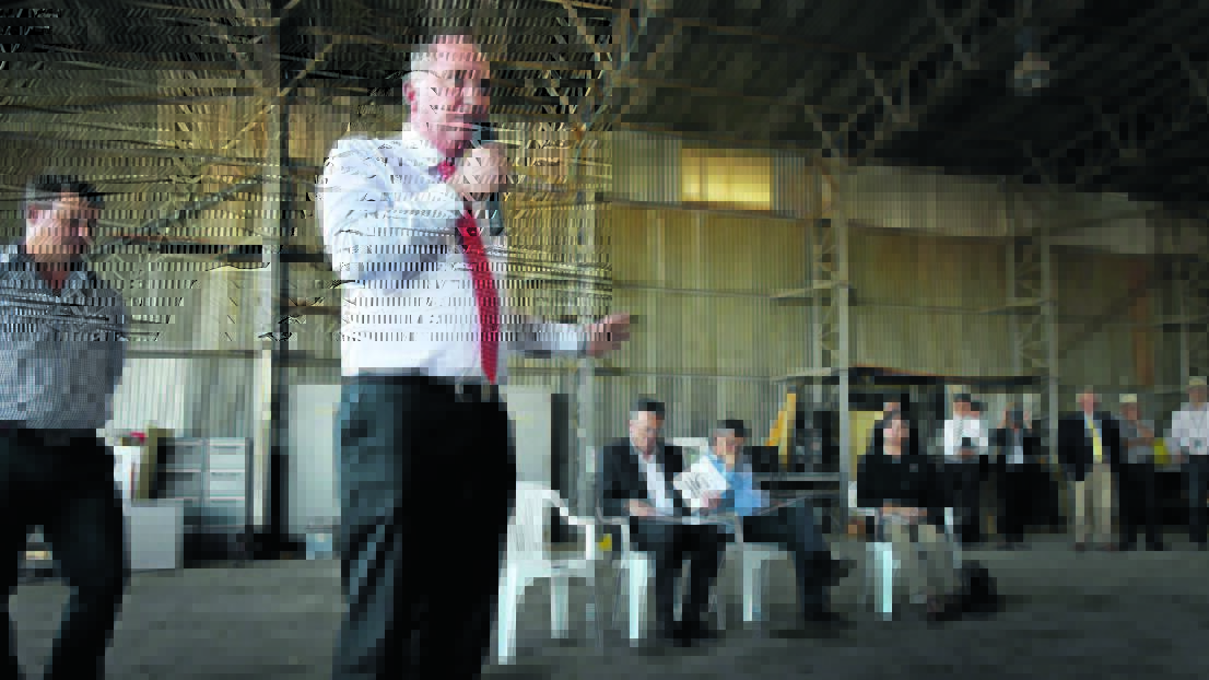 HUNDREDS RALLY: Deputy PM Barnaby Joyce, with Ben Morgan on the left and Transport Minister Darren Chester, CASA chairman Jeff Boyd and board member Anita Taylor, seated, at an aviation rally in Tamworth yesterday. Photo: Geoff O’Neill 