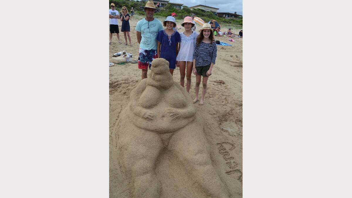 BROULEE: Mossy Point's Greg Sparrius, Ana Ellwood, Pip Sparrius and Kelsey Gillan of Mossy Point won runner-up sculpture with their ‘Jenny’ the fat lady at the Broulee Sand Modelling and Sand Castle Competition at North Broulee Beach on New Year's Eve. 