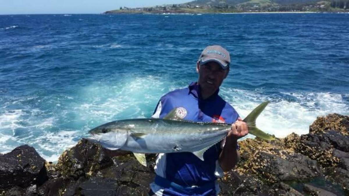 Nick Hodgkins with a solid kingfish from the rocks at Kiama.