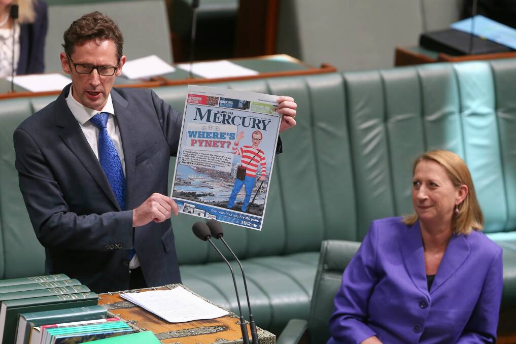 Labor MPs Stephen Jones and Sharon Bird hold the Mercury's "Where's Pyney?" front page aloft in Parliament on December 2, 2015. Picture: Alex Ellinghausen