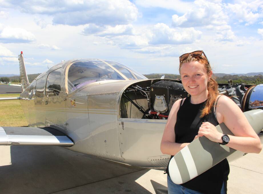 Breaking barriers: Standing with her Piper Cherokee Six, Merimbula pilot Laura Koerbin is excited to help teach female pilots some basic aircraft maintenance. 