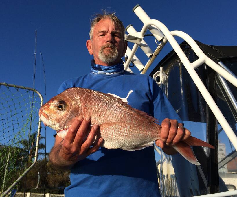Catch of the day: Keen fisherman David Sydenham of Tura Beach showing off a lovely looking Snapper which he caught recently off Long Point in Merimbula. 