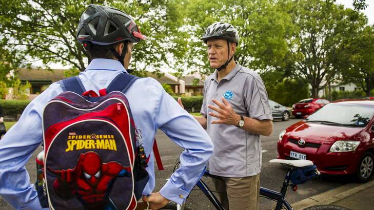 Minister Peter Garret speaks to Andrew Leigh MP following their ride to Ainslie North Primary School on Ride2School day. Photo: Rohan Thomson