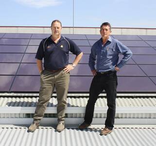 • Bega Agricultural Services’ Peter Abramowski (left), and Solarshop Australia renewable energy adviser Reg Wells  are concerned about the State Government’s drastic cost reduction of its solar feed-in tariff.