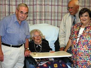 Linda Guthrey at her 101st birthday party on Wednesday with (from left) her nephew Brian Whyman, stepson Lloyd Guthrey and niece, Jill Whyman.