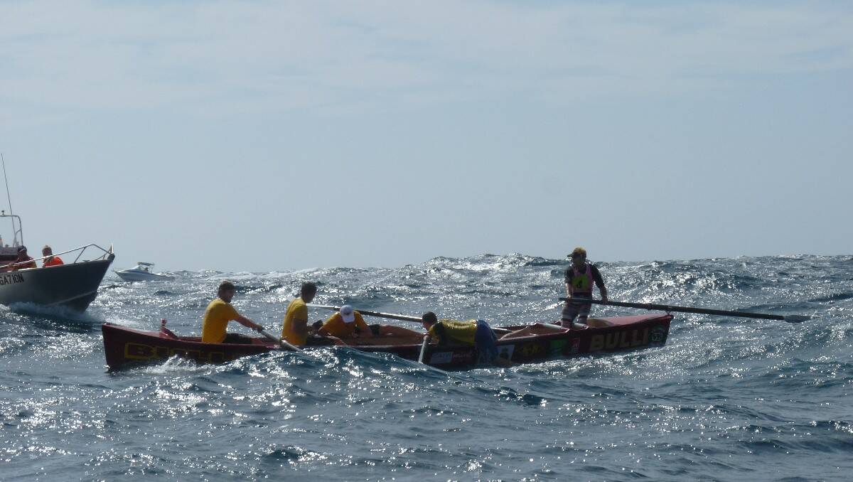 The Bulli men's crew undertakes a changeover during day five's race. Photo courtesy of Kimberley Granger.
