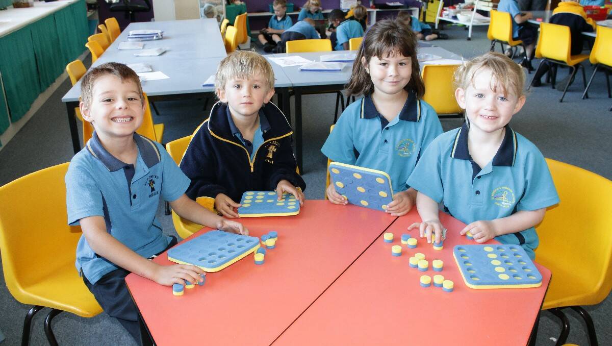 Playing with Poly Plugs are St Patrick’s Primary School Kindergarten pupils (from left) Jaxson Dibley, Edward Tomlinson, Olivia Stroud and Jessica Gatehouse. Photos: Josh Bartlett