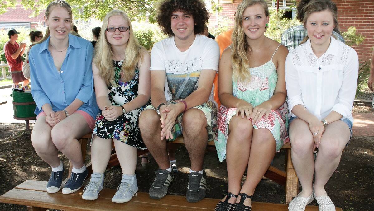 Relieved after receiving their ATAR results are graduating Bega High School students (from left) Miriam Zweck, Catie Wheeler, Josh Bennett, Molly Willington and April Alcock. 