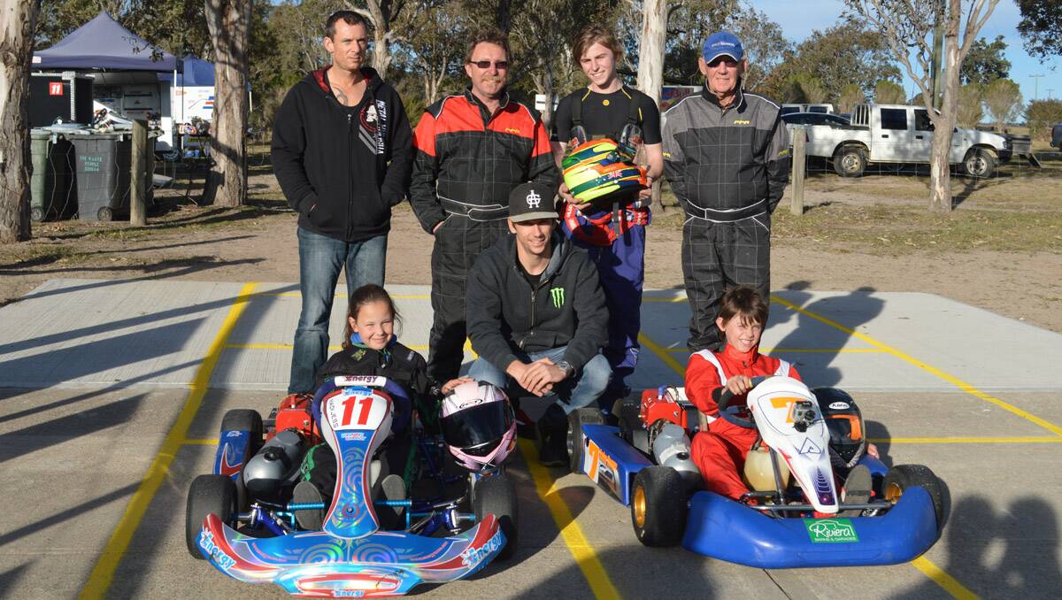 Learning from Australia's number one go-kart racer David Sera (front, centre) are Sapphire Coast Kart Club members (back, from left) Clifton Young, Tery McConkey, Jack Loftus, Colin Trezise, (front) Madison Jess and Bailey Cooper.