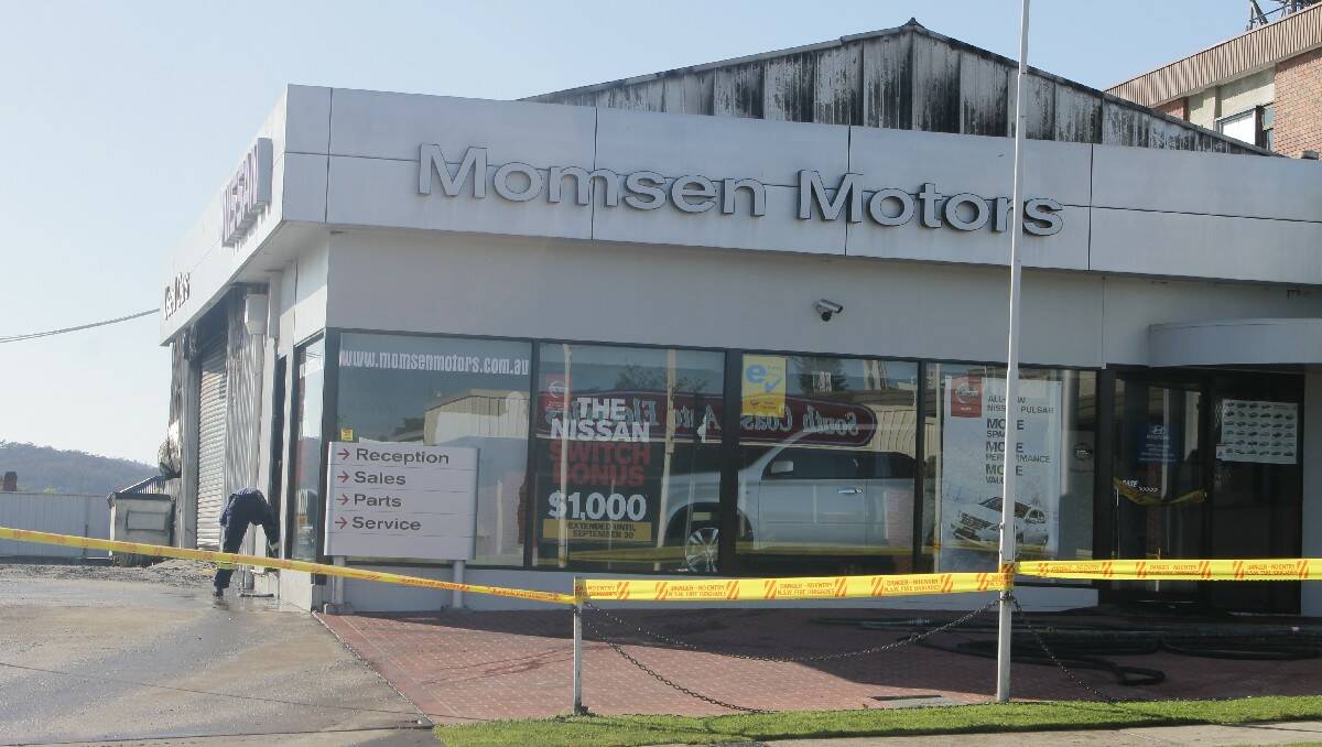 The aftermath of the fire that tore through the Momsen Motors, Bega, car dealership early Saturday morning.