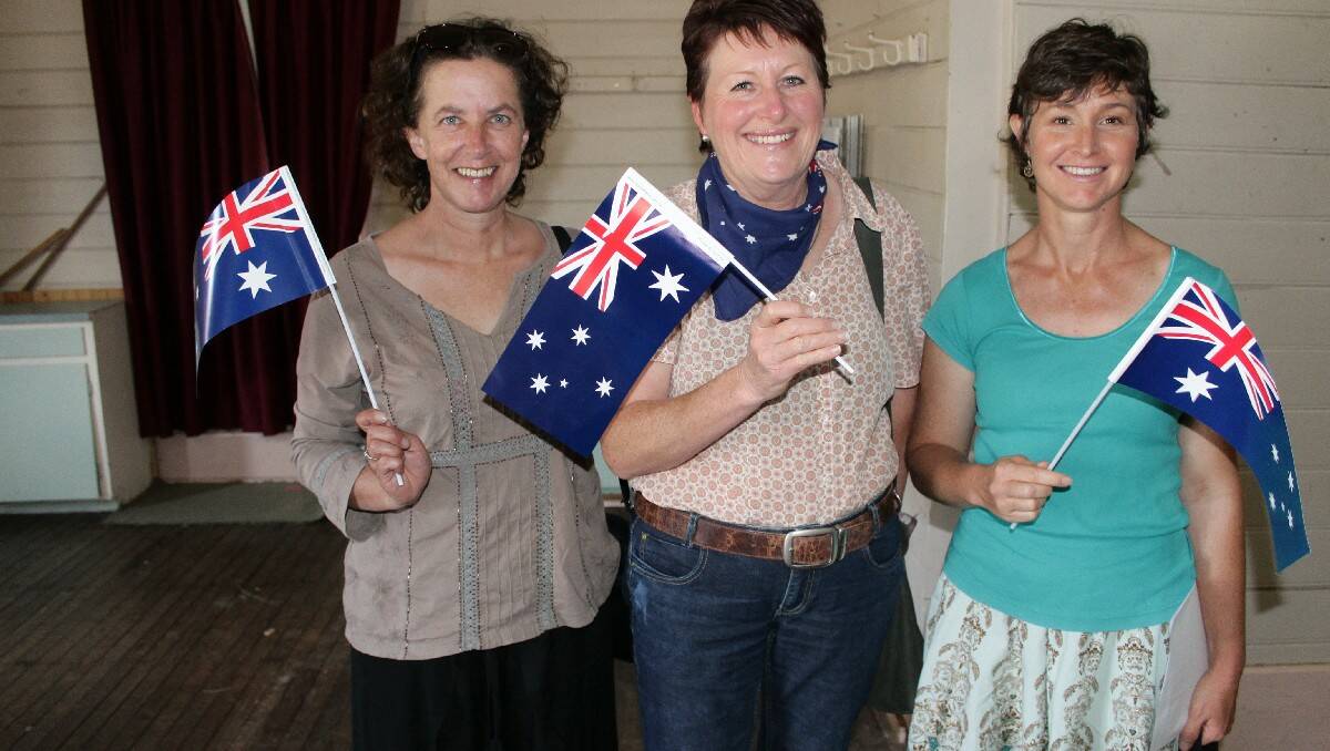 Showing their support at the Australia Day ceremony in Cobargo are (from left) Letitia Carroll, June Tarlinton and Sonia Evans.
