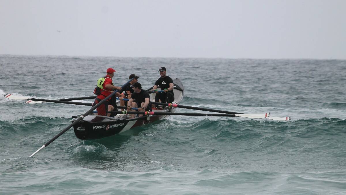 The Moruya Vikings men’s crew are the last team to head to the starting line at Tathra Beach on day six of the George Bass Surf Marathon.