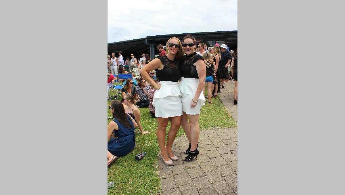 Happy to be rocking matching dresses at the Boxing Day races are Nat Adams (left) and Lisa Oldham.