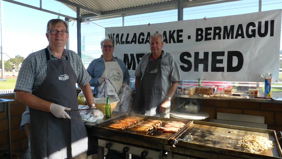 Keeping the crowd well fed are Wallaga Lake-Bermagui Men's Shed members (from left) Fergus McWhirter, Keith Driver and Stephen Knight.