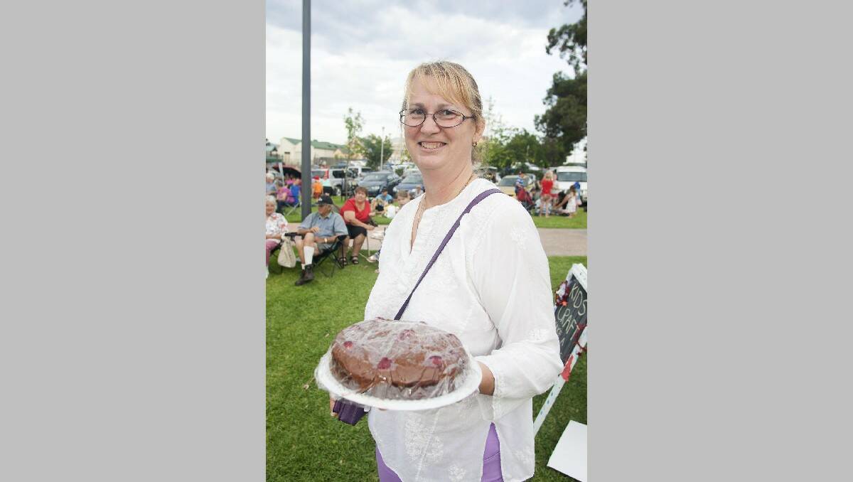 Fiona Avery sells cake for Anglican Parish Ladies.