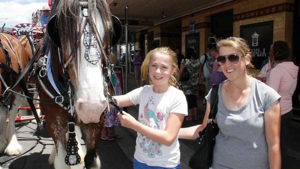 Cobargo’s Madison Boyle, 10, and her mum Tania are excited to meet one of the Clydesdales on Tuesday.