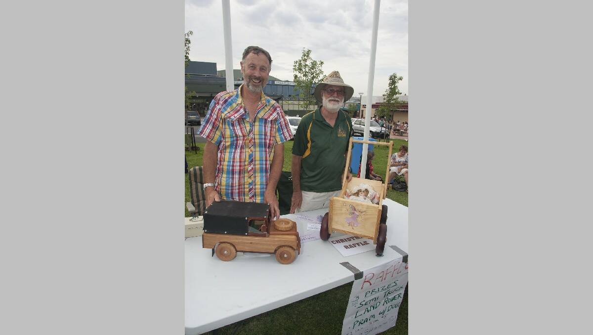 Ken Sullivan and Richard Kleine of the Bega "Woodies" sell tickets in their raffle.