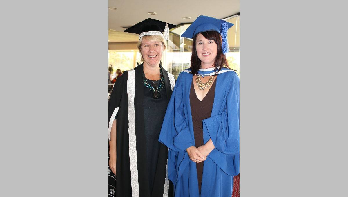 Jodie Stewart of Bega, who received her Bachelor of Arts Honours at yesterday’s UOW graduation ceremony, is congratulated by deputy vice-chancellor (education) Professor Eeva Leinonen.