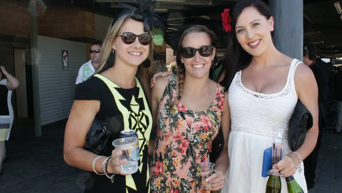 Relaxing at the Sapphire Coast Turf Club race meeting are (from left) Tarryn Lucas, Shae Lawler and Alyce Prior.