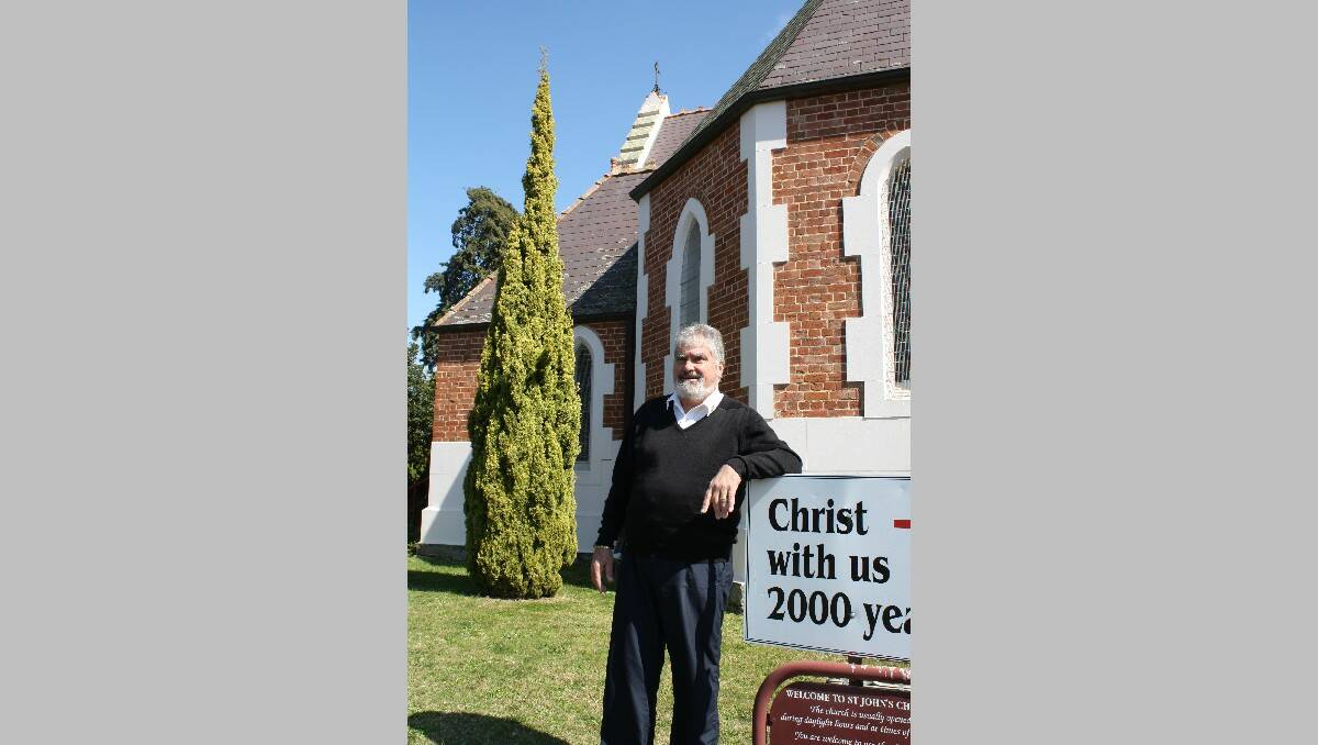 Chris Short stands outside the St John’s Anglican Church in 2011, after stepping down as the parish’s rector.