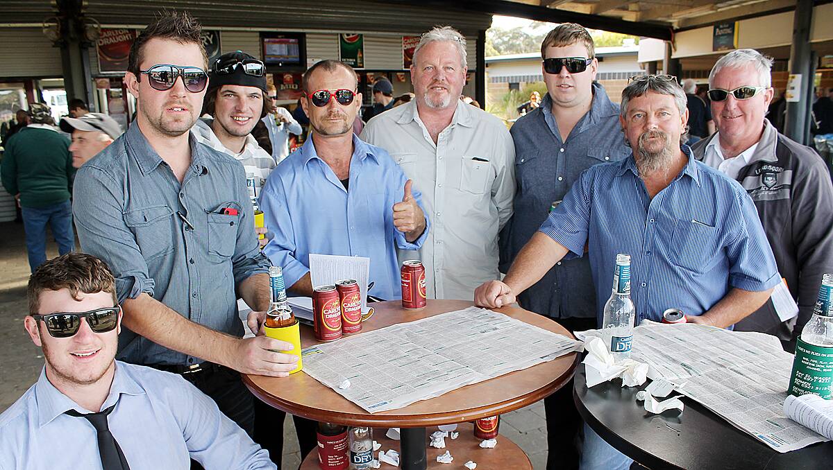The lads from the Coominya Crabcatchers cricket team in Queensland enjoy their annual visit to the Kalaru race track. Pictured are (from left) Luke McLoughlin, Caleb Inch, Brad Matt, John Hunt, Shane Orsen, Joel Long, Ian Edyvean and Noel Short.