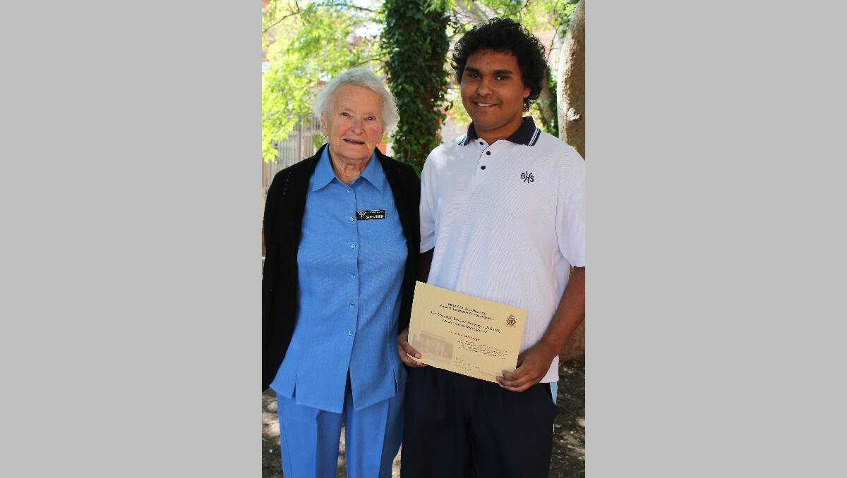 Bega High School Year 12 student Gary Lonesborough received the Ladies Auxiliary award from Isabel Bobin.