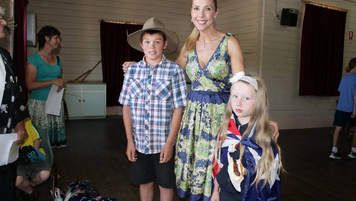 The Bega Valley's Australia Day Ambassador Catriona Rowntree meets Cobargo locals Alexander Morris, 11, and Bella, 7.