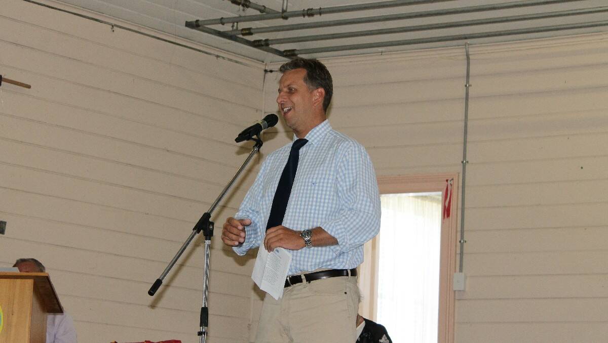 Member for Bega Andrew Constance shares a joke during Sunday's Australia Day ceremony at Cobargo.